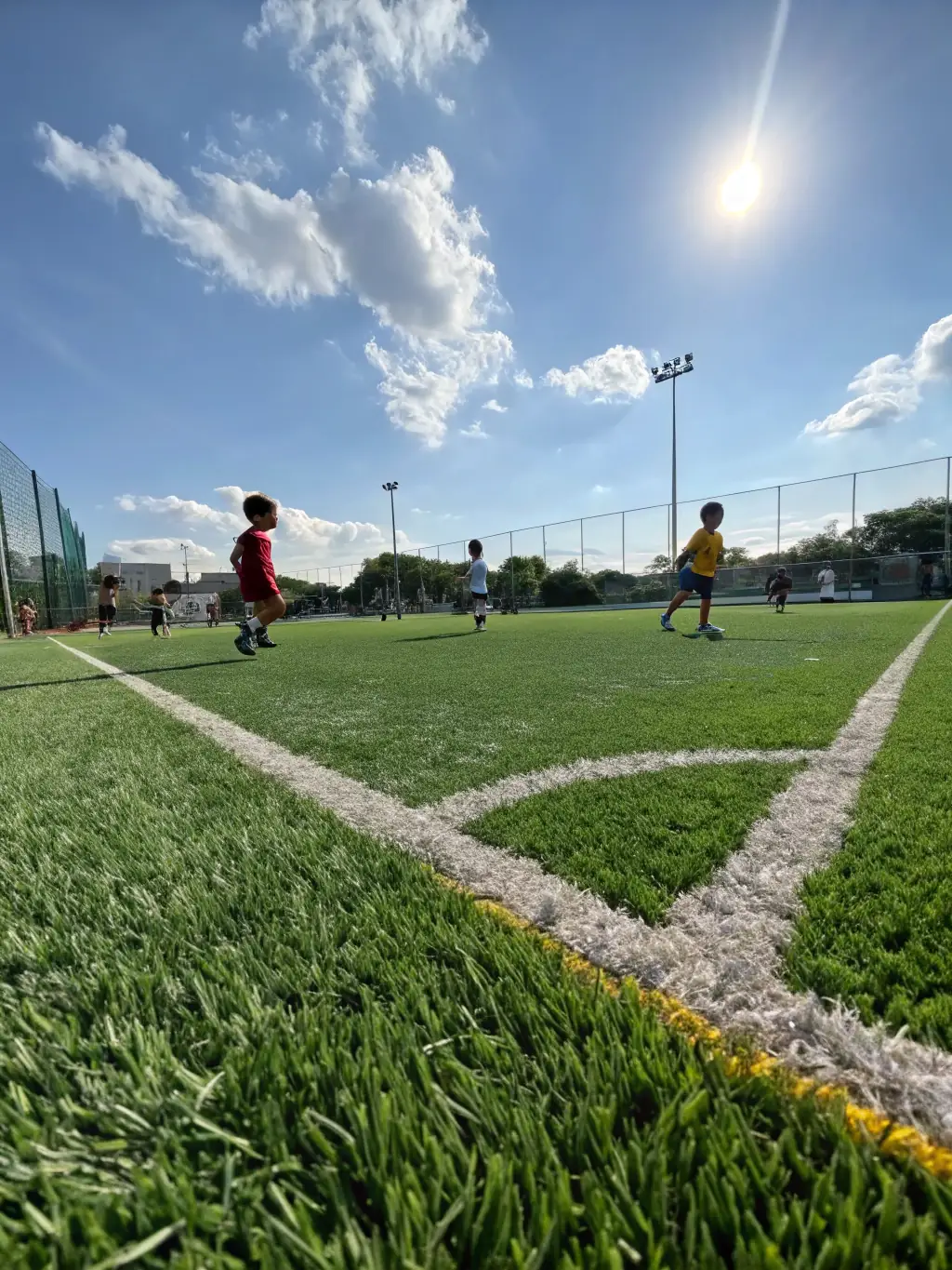 A time-lapse video showing a playground with Hall Turf's artificial turf maintaining its lush green appearance throughout the year, despite changing weather conditions.